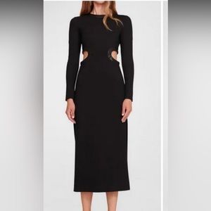 Staud dolce cutout vegan leather trim around waist.